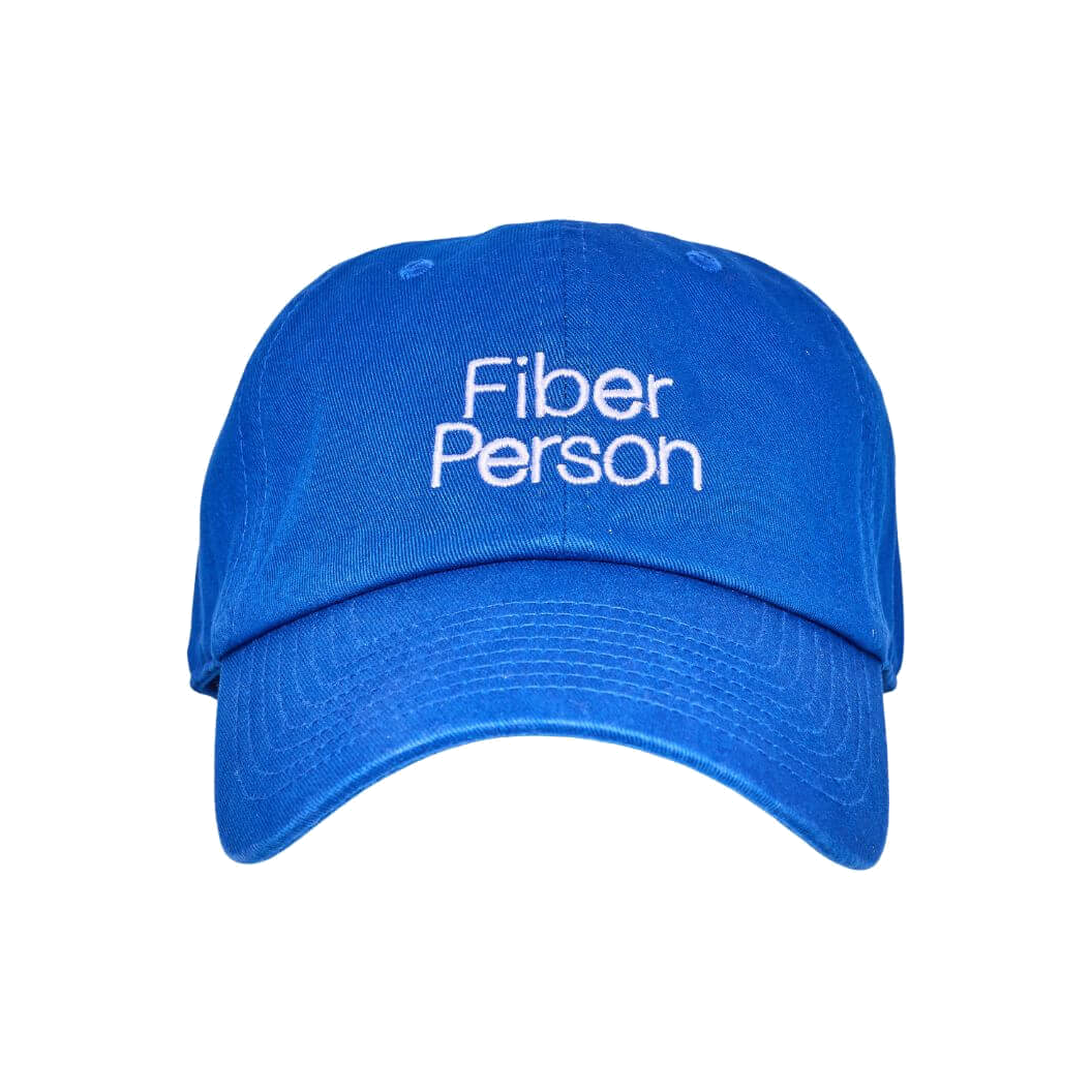 Blue cap with 'Fiber Person' text on a white background